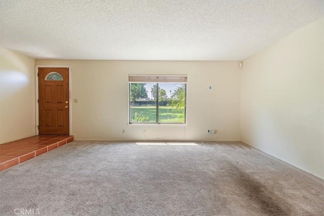 2829 Irving St, Riverside, CA 92504 - carpeted empty room with a textured ceiling