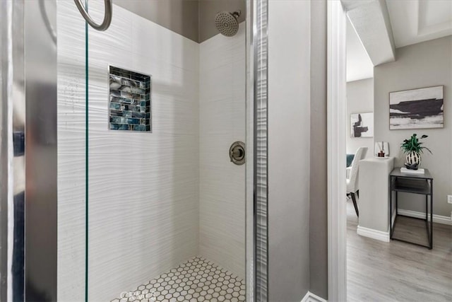 420 Deodar St, Redlands, CA 92374 - bathroom with a stall shower and wood finished floors