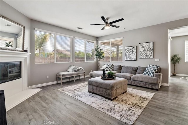 420 Deodar St, Redlands, CA 92374 - living area featuring ceiling fan, wood finished floors, and a glass covered fireplace