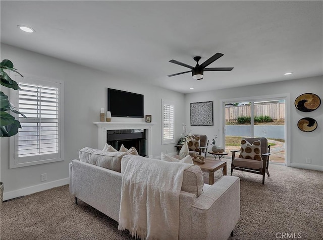 2867 Turnbull St, Oceanside, CA 92054 - carpeted living room with a fireplace, ceiling fan, healthy amount of natural light, and recessed lighting