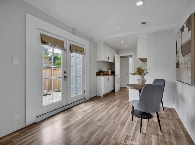 2867 Turnbull St, Oceanside, CA 92054 - dining area featuring french doors, light wood-type flooring, and recessed lighting