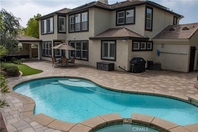 1671 Fairway Dr, Corona, CA 92883 - view of swimming pool with a grill, a patio area, and a pool with connected hot tub
