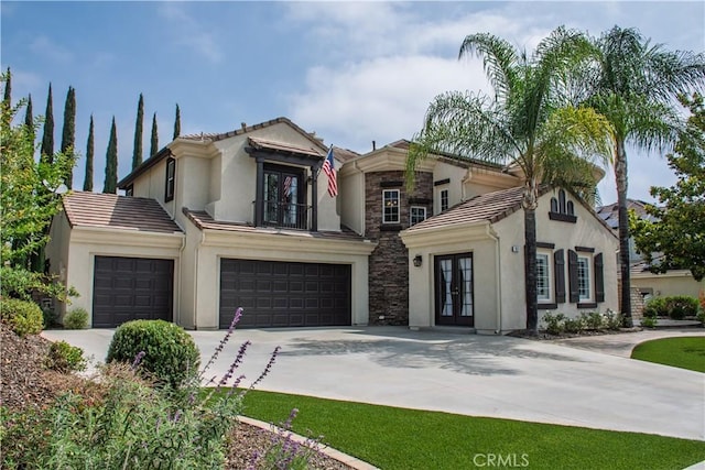 1671 Fairway Dr, Corona, CA 92883 - view of front of house with french doors, stucco siding, driveway, a tile roof, and a garage