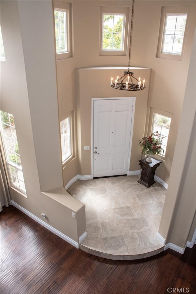 1671 Fairway Dr, Corona, CA 92883 - entryway with a high ceiling, a chandelier, and plenty of natural light