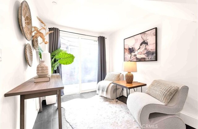 1131/2 N Manhattan Pl, Los Angeles, CA 90004 - sitting room with tile patterned floors