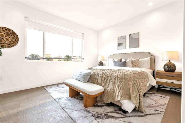 1131/2 N Manhattan Pl, Los Angeles, CA 90004 - bedroom with wood finished floors and recessed lighting