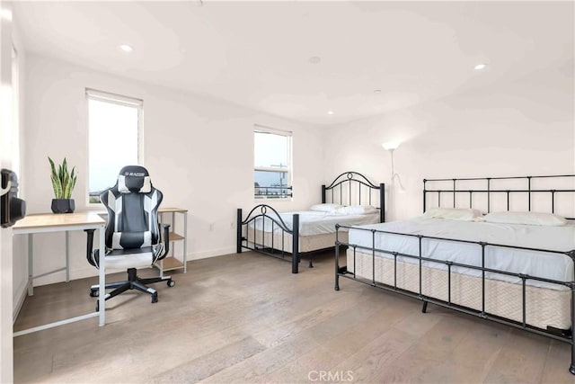1131/2 N Manhattan Pl, Los Angeles, CA 90004 - bedroom featuring wood finished floors and recessed lighting