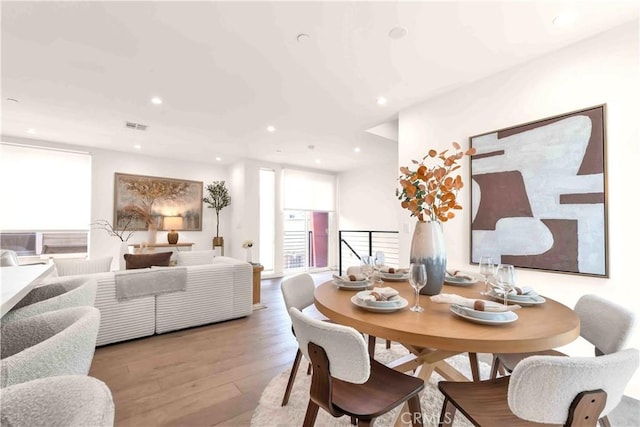 1131/2 N Manhattan Pl, Los Angeles, CA 90004 - dining space with hardwood / wood-style flooring and recessed lighting