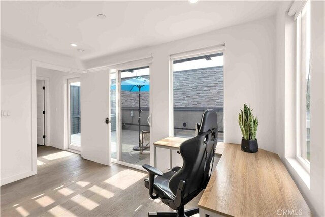 1131/2 N Manhattan Pl, Los Angeles, CA 90004 - office featuring wood finished floors and recessed lighting