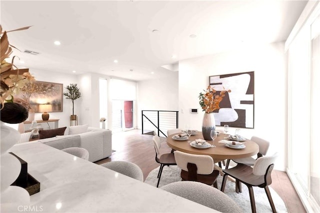 1131/2 N Manhattan Pl, Los Angeles, CA 90004 - dining room with light wood-type flooring and recessed lighting