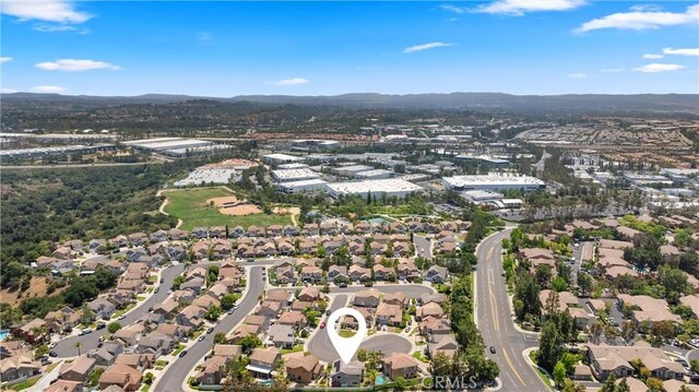 8 Chatri Cir, Lake Forest, CA 92610 - aerial overview of property's location with nearby suburban area