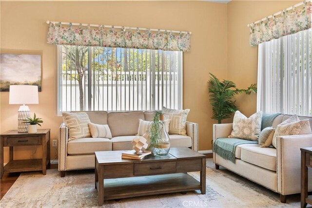8 Chatri Cir, Lake Forest, CA 92610 - living room featuring plenty of natural light and wood finished floors