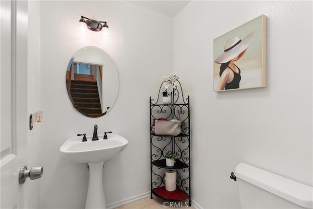 8 Chatri Cir, Lake Forest, CA 92610 - half bathroom featuring toilet and baseboards