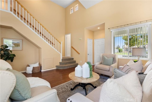 8 Chatri Cir, Lake Forest, CA 92610 - living room featuring wood finished floors, stairs, and a high ceiling