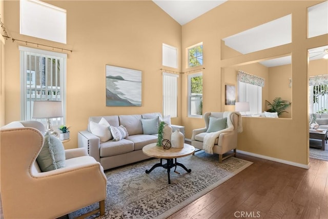 8 Chatri Cir, Lake Forest, CA 92610 - living area featuring healthy amount of natural light, hardwood / wood-style floors, and high vaulted ceiling