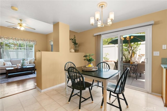 8 Chatri Cir, Lake Forest, CA 92610 - dining space featuring a chandelier and ceiling fan