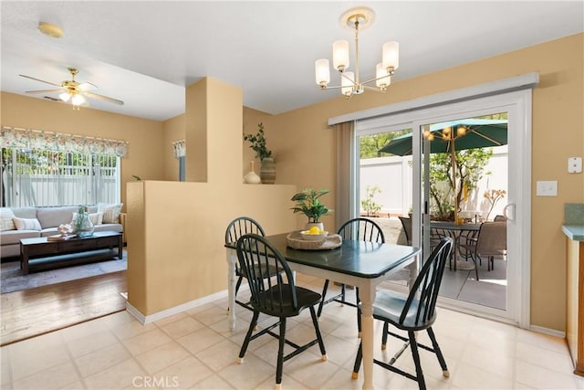 8 Chatri Cir, Lake Forest, CA 92610 - dining area with a chandelier and ceiling fan