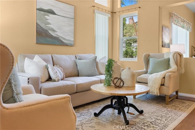 8 Chatri Cir, Lake Forest, CA 92610 - living room featuring baseboards and wood finished floors