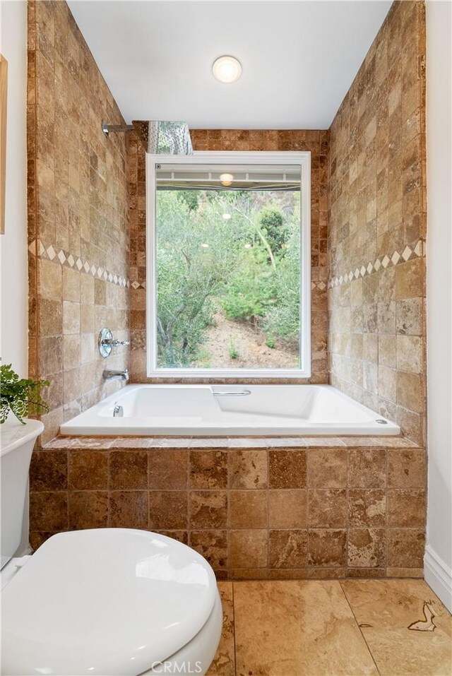 9767 Blantyre Dr, Beverly Hills, CA 90210 - full bath featuring tiled bath and tile walls