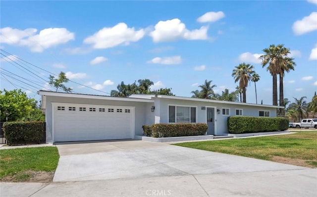 18091 Vine St, Fontana, CA 92335 - single story home with stucco siding, a garage, driveway, and a front lawn