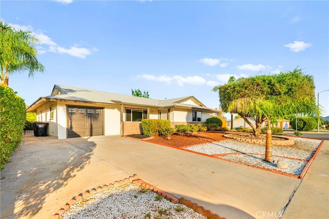 28610 Portsmouth Dr, Menifee, CA 92586 - ranch-style home featuring a garage, driveway, and stucco siding