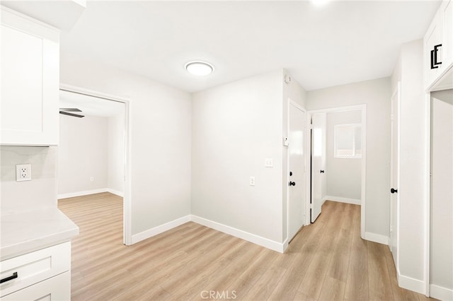 28610 Portsmouth Dr, Menifee, CA 92586 - hall featuring light wood-style flooring and baseboards