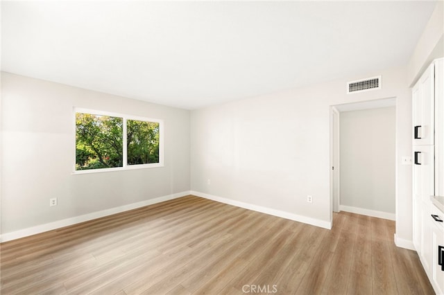 28610 Portsmouth Dr, Menifee, CA 92586 - spare room featuring light wood-type flooring and baseboards