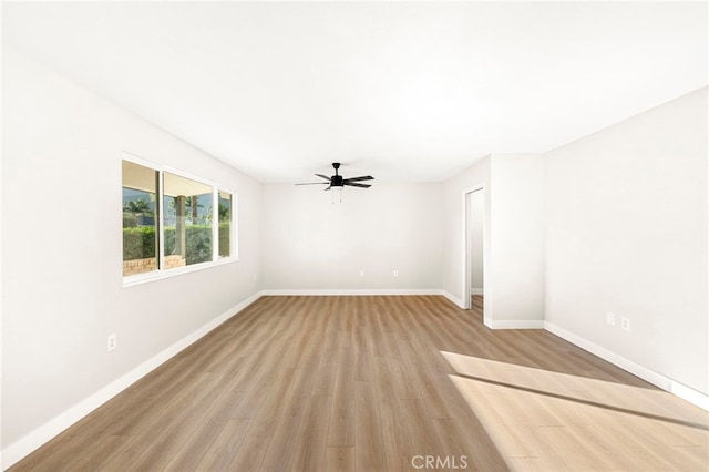 28610 Portsmouth Dr, Menifee, CA 92586 - empty room featuring ceiling fan and light wood-style floors