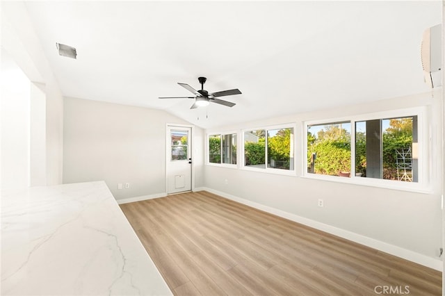 28610 Portsmouth Dr, Menifee, CA 92586 - spare room with light wood-style floors, a ceiling fan, and lofted ceiling