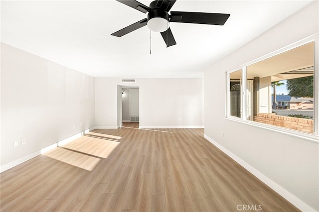 28610 Portsmouth Dr, Menifee, CA 92586 - empty room featuring light wood finished floors and a ceiling fan