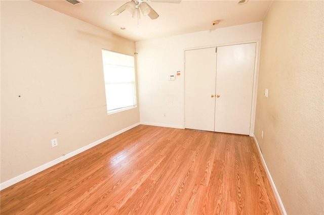 19385 Live Oak Ln, Lake Elsinore, CA 92530 - unfurnished bedroom with light wood-style floors, a closet, and ceiling fan