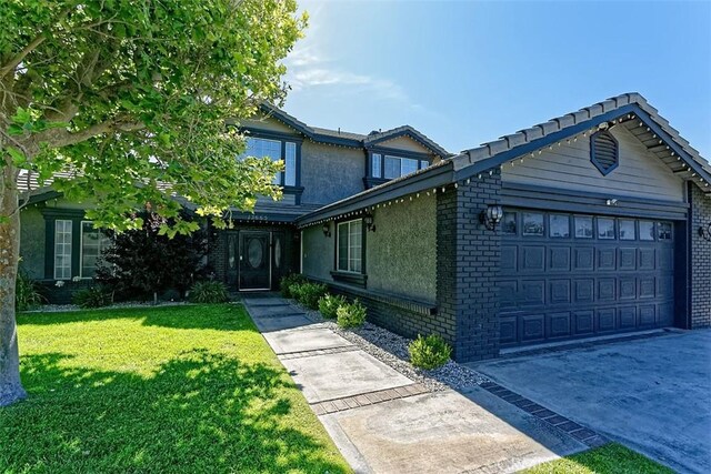13665 Hidden Valley Rd, Victorville, CA 92395 - traditional-style house featuring brick siding, an attached garage, a front lawn, stucco siding, and concrete driveway