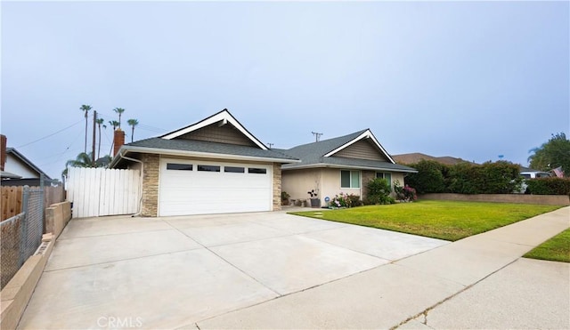 9025 La Vine St, Rancho Cucamonga, CA 91701 - single story home with an attached garage, driveway, stone siding, and roof with shingles