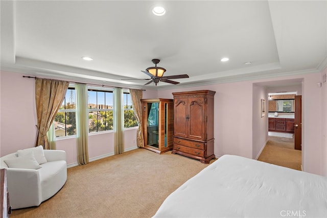 14 Downing St, Ladera Ranch, CA 92694 - bedroom with light colored carpet, a tray ceiling, multiple windows, recessed lighting, and ceiling fan