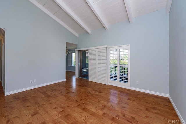 17159 W Bernardo Dr Unit 202, San Diego, CA 92127 - empty room with beamed ceiling, wood finished floors, and high vaulted ceiling