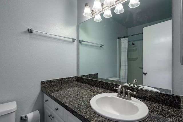 17159 W Bernardo Dr Unit 202, San Diego, CA 92127 - bathroom featuring vanity, a shower with curtain, and a textured wall