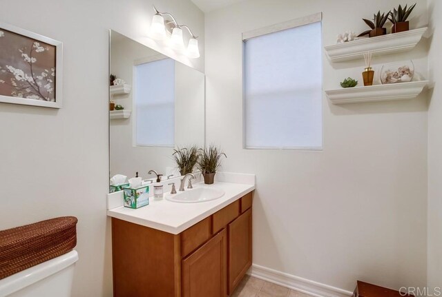1873 El Paseo Ave, Chula Vista, CA 91913 - bathroom featuring vanity, healthy amount of natural light, and tile patterned flooring