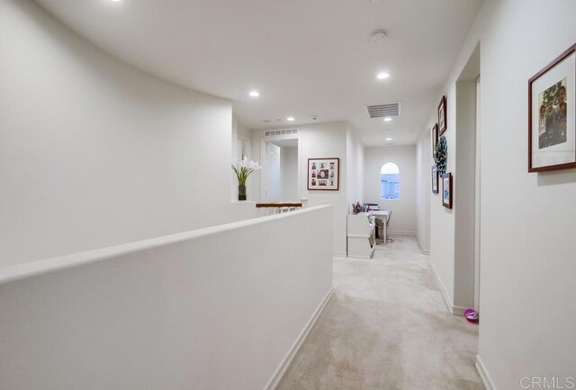 1873 El Paseo Ave, Chula Vista, CA 91913 - corridor with recessed lighting, light carpet, and an upstairs landing