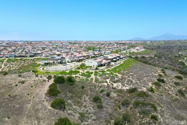 1873 El Paseo Ave, Chula Vista, CA 91913 - aerial view of property and surrounding area with nearby suburban area and mountains