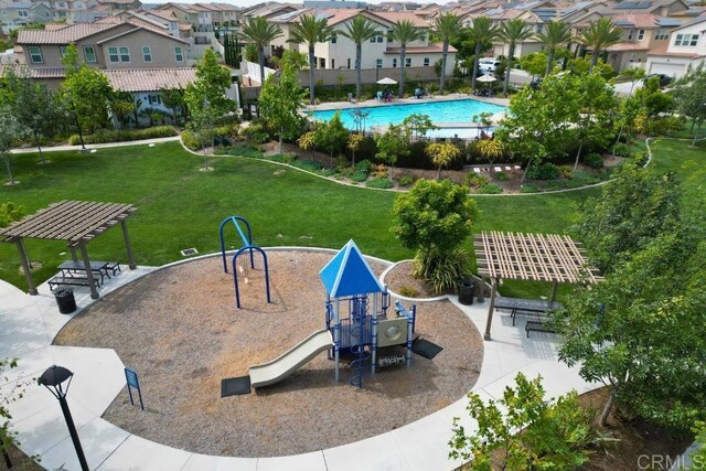1873 El Paseo Ave, Chula Vista, CA 91913 - view of home's community with a yard, a residential view, and a swimming pool