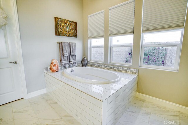 916 Trail View Pl, Nipomo, CA 93444 - bathroom featuring marble finish floors and a bath