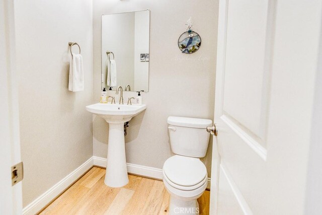 916 Trail View Pl, Nipomo, CA 93444 - half bath featuring wood finished floors and toilet