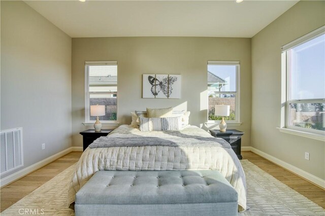916 Trail View Pl, Nipomo, CA 93444 - bedroom featuring wood finished floors and multiple windows