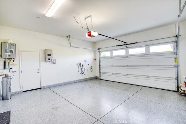 916 Trail View Pl, Nipomo, CA 93444 - garage with a garage door opener and tankless water heater