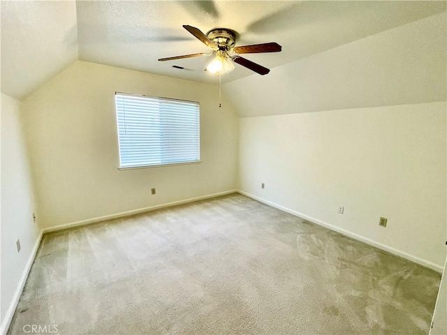 659 Royal Arch Ct, Merced, CA 95340 - additional living space with vaulted ceiling, ceiling fan, and carpet