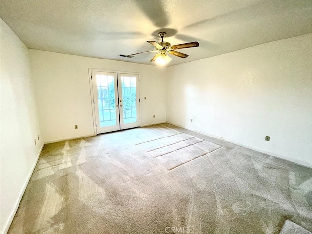 659 Royal Arch Ct, Merced, CA 95340 - spare room featuring french doors, a ceiling fan, and light colored carpet