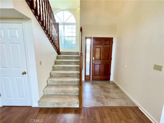 659 Royal Arch Ct, Merced, CA 95340 - foyer with stairs and wood finished floors