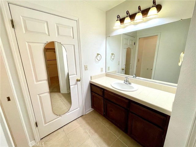 659 Royal Arch Ct, Merced, CA 95340 - bathroom with vanity and tile patterned floors