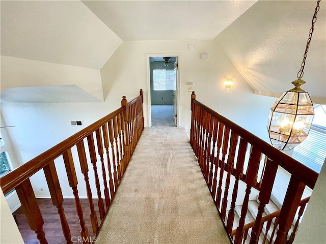 659 Royal Arch Ct, Merced, CA 95340 - hall featuring vaulted ceiling, an upstairs landing, and carpet flooring