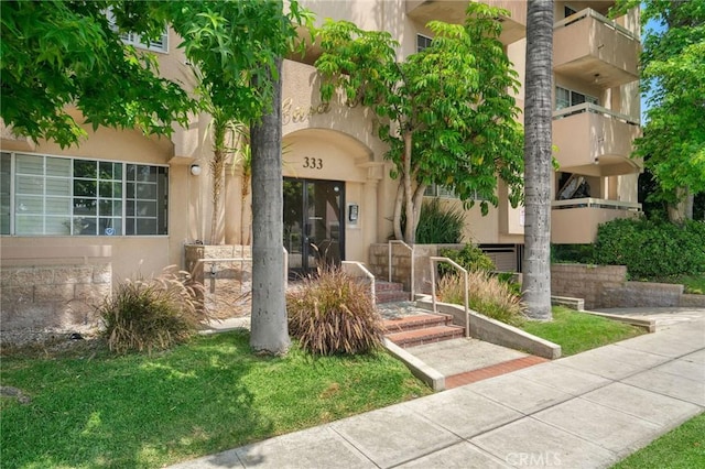 333 W Alameda Ave Unit 208, Burbank, CA 91506 - property entrance with stucco siding